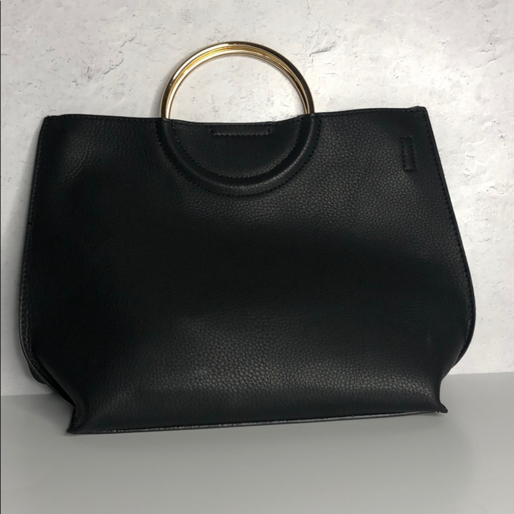 Small black faux leather purse w/ strap extension